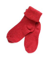 Pair of knitted socks on white background