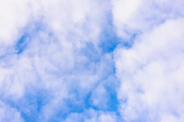 Obraz premium Bright blue winter sky with clouds.