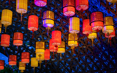 Vibrant colors of Chinese lantern ornament decorations for the Mid Autumn Festival, celebration of luck, health, happiness and prosperity in Singapore © SvetlanaSF