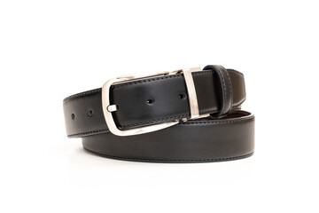 Double-sided black and brown leather belt with an unbuttoned buckle on a white background.