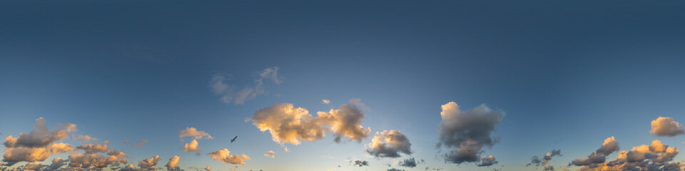 Dark blue sunset sky panorama with Cumulus clouds. Seamless hdr pano in spherical equirectangular format. Complete zenith for 3D visualization, game and sky replacement for aerial drone 360 panoramas.