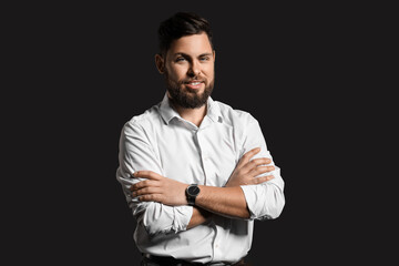 Stylish bearded man on dark background