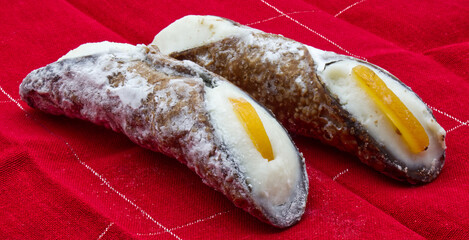 Sweet Cannolo Siciliano. Traditional south Italian dessert. Delicious Sicilian Cannolo filled with...