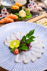 A dish of Sashimi with radish sauce