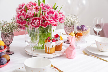 Dinnerware, Easter cakes and beautiful tulips on served table