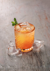 citrus orange cocktail on gray background