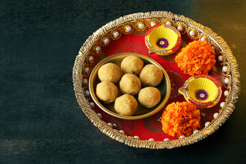 Diwali sweets besan ladoo Laddu red pooja thali plate Indian sweet festival dish mithai dessert Dussehra Holi ganesh chaturthi Ram navami Durga pooja ashtami Navratri Mumbai Kerala India Sri Lanka