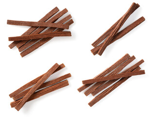 Sandalwood sticks isolated on white background, top view