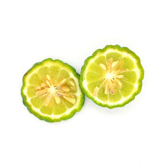 two Kaffir lime slice on white background