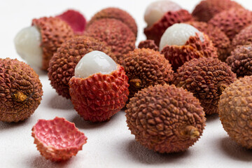 Bunch of lychee fruit on white. Close up.