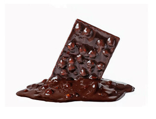 Dark chocolate bar melted and nuts chocolate cream