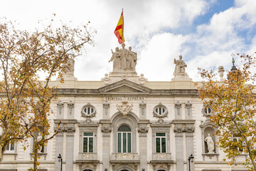 A view of the Detail of the main facade of the Supreme Court building in Madrid, Spain