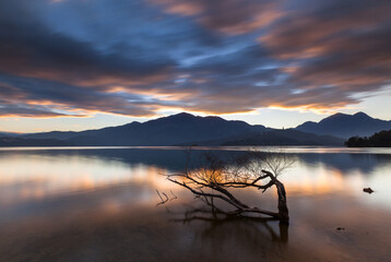 Asia culture - Beautiful landscape of lake level reflect fantasy dramatic sunrise sky in Sun Moon Lake , in Taiwan, Asia. the famous travel attractions in Nantou ,Taiwan. Scenery of Sun Moon Lake,
