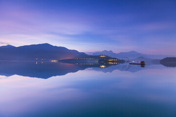 Asia culture - Beautiful landscape of lake level reflect fantasy dramatic sunrise sky in Sun Moon Lake , in Taiwan, Asia. the famous travel attractions in Nantou ,Taiwan. Scenery of Sun Moon Lake, 