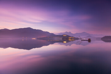 Asia culture - Beautiful landscape of lake level reflect fantasy dramatic sunrise sky in Sun Moon Lake , in Taiwan, Asia. the famous travel attractions in Nantou ,Taiwan. Scenery of Sun Moon Lake, 