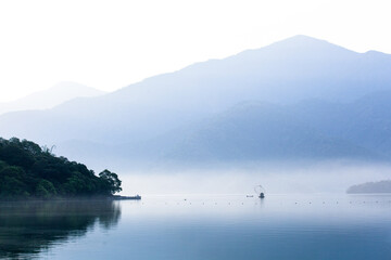 Asia culture - Beautiful landscape of lake level reflect fantasy dramatic sunrise sky in Sun Moon Lake , in Taiwan, Asia. the famous travel attractions in Nantou ,Taiwan. Scenery of Sun Moon Lake, 