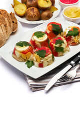Portion of delicious chicken aspic on a plate isolated on white background