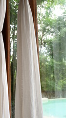white curtain in the room with natural background