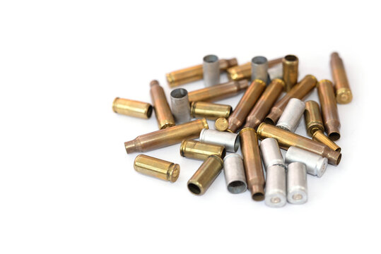 empty cartridge cases for shooting on a white