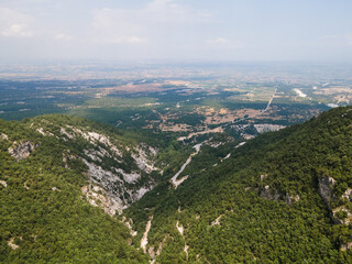 Fototapeta na wymiar Aerial drone panoramic view of deep gorge and rocky ridge of the legendary Mountain Olympus