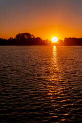 Naklejka premium Beautiful sunset with reflections at Plattling, Isar, Bavaria, Germany