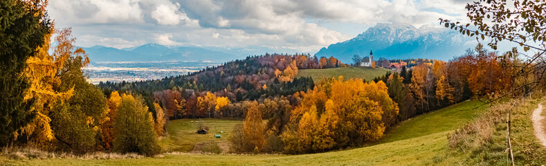 Beautiful autumn or indian summer view at the famous Neubichler Alm, Piding, Bavaria, Germany