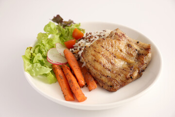 Grilled chicken with rice isolated in white background