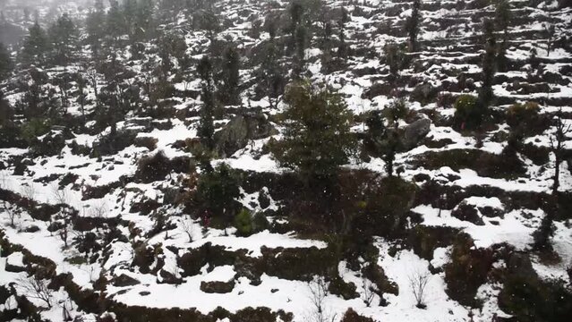 Village homes covered in snow during winters in India