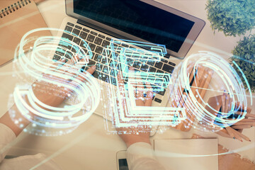 Double exposure of woman hands working on computer and SEO hologram drawing. Top View. Search optimization concept.