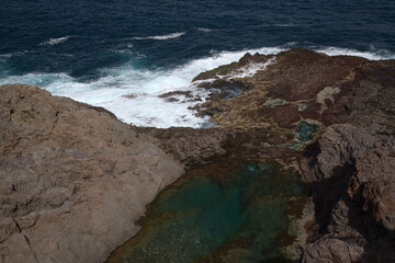North of Gran Canaria, rockpools and natural swimming pools around Faro de Sardina lighthouse, 
the...