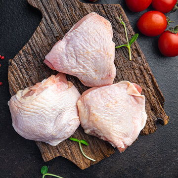 chicken thigh poultry raw meat fresh portion healthy meal food diet snack on the table copy space food background keto or paleo diet