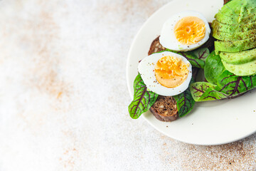 open sandwich egg, avocado, whole wheat bread breakfast sandwich healthy food fresh healthy meal food diet snack on the table copy space food background