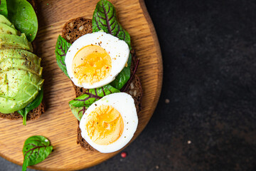 open sandwich egg, avocado, whole wheat bread breakfast sandwich healthy food fresh healthy meal food diet snack on the table copy space food background
