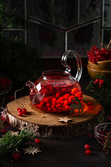 Healthy hot drink with red berries viburnum. Christmas drinks. Winter or autumn tea.