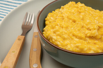 butternut risotto in a bowl on a table