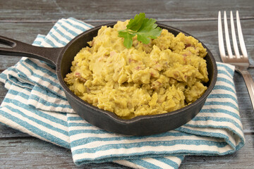 mashed split peas in a pan on a gray background