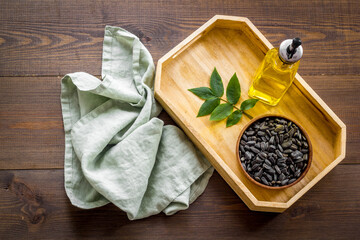 Sunflower oil in bottle with seeds. Cooking oil background