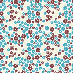 Colorful floral pattern in childish style. Seamless background with blue, yellow, and dark red flowers. Texture for fabric, wrapping paper, stationery, textile, wallpapers.