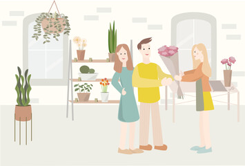 People in flowers shop are buying flowers