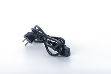 close-up view of electrical plug, black power cord isolated on white background