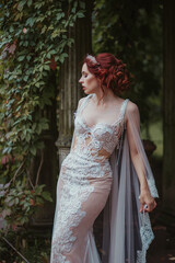 young woman bride posing in beautiful dress