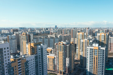 City view from a height, many high-rise buildings to the horizon.