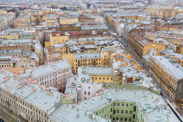 Obraz premium Cityscape aerial view of the rooftops in the central area of the city of St. Petersburg, deck houses, residential buildings.