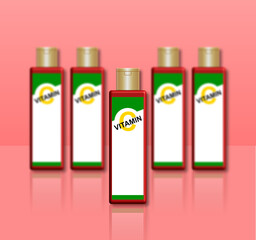 Fünf Flaschen mit Vitamin c vor rosa Hintergrund