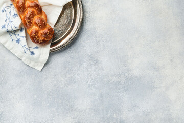 Sabbath kiddush ceremony composition. Challah bread. Freshly baked homemade braided challah bread...