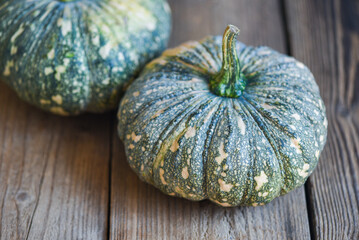 green pumpkin food on wooden background, fresh Asian Thai pumpkin frome the garden for cooked food or dessert