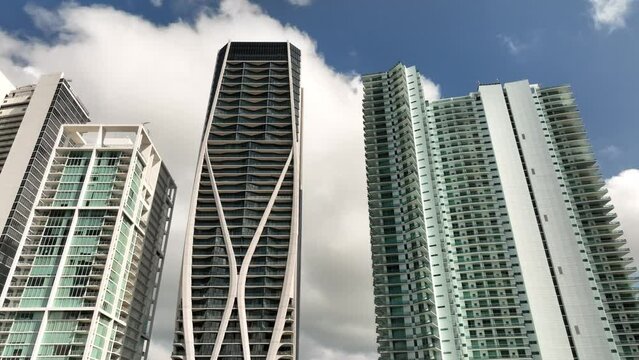 Low angle shot facing up on highrise towers at Downtown Miami FL