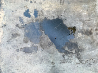 Car engine oil stains on the cement floor
