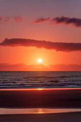Gold coast beach colourful orange sky with clouds at sunrise