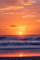 Gold coast beach colourful orange sky with clouds at sunrise